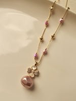 Load image into Gallery viewer, Necklace with Pink Beads and a Large Pink Pearl Pendant | Rose Gold Tone Floral Clover Pendant Necklace with Metallic Pearl Drop