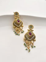 Load image into Gallery viewer, Golden earrings with red gemstones and green beads.