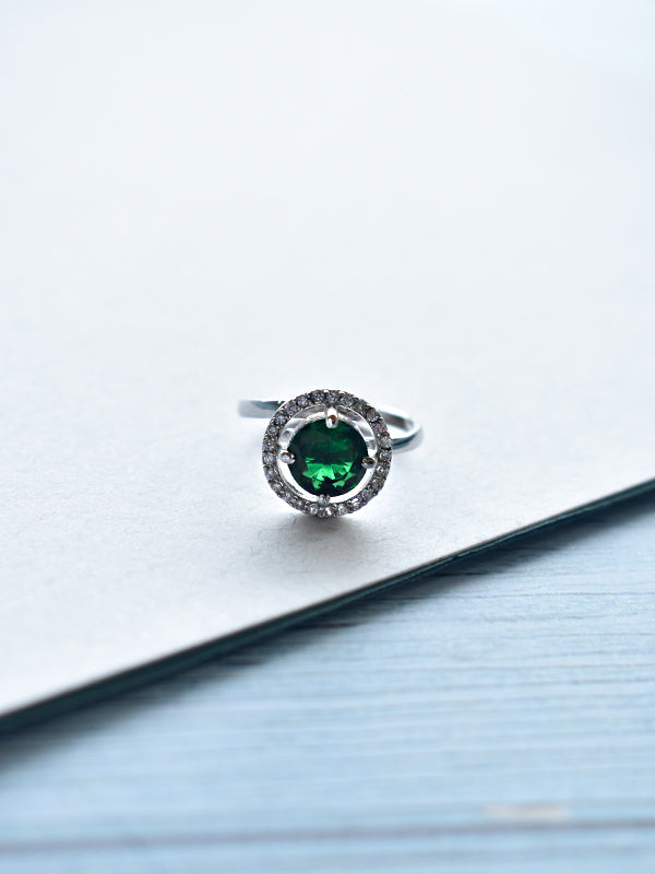 Finger ring clearance with green stone