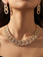 Load image into Gallery viewer, Modern Geometric Interlocking Ring Golden Necklace Set | Sparkling AD Wave Link Partywear Necklace