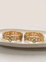 Load image into Gallery viewer, Two golden bracelets with intricate designs