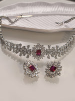 Load image into Gallery viewer, Jewelry set with necklace and earrings featuring red stones 
