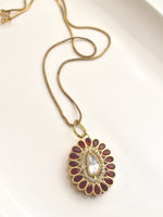 Load image into Gallery viewer, Necklace with a Decorative Pendant | Pendant Set with Kundan and Red Stones
