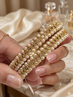 Load image into Gallery viewer, The Royal Moti Criss-Cross Bangles | Classic Golden Thread Beads Bangles
