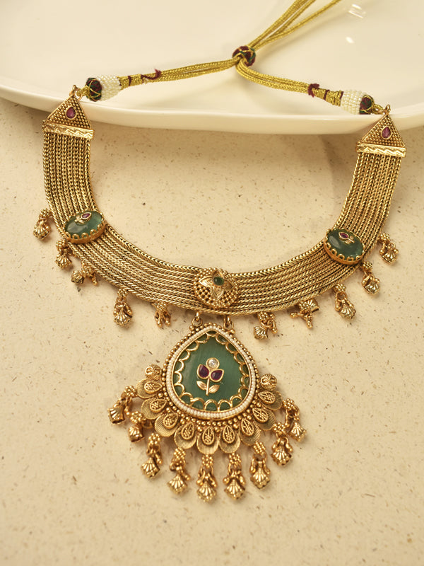 Ornate gold toned traditional necklace with green stone | multi strand necklace with a large teardrop pendant