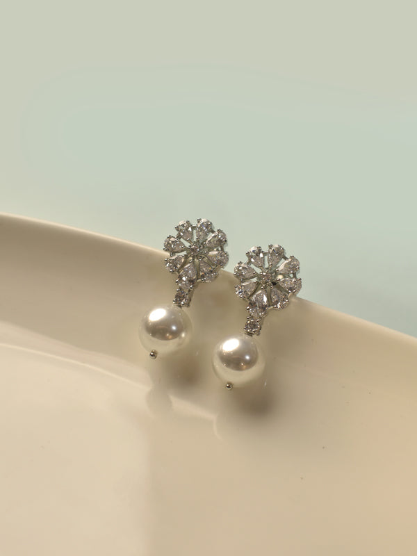 Snowflake shaped earrings with white pearls | white pearl earrings with ad stone