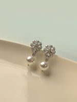 Load image into Gallery viewer, Snowflake-Shaped Earrings with White Pearls | White Pearl Earrings with AD Stone

