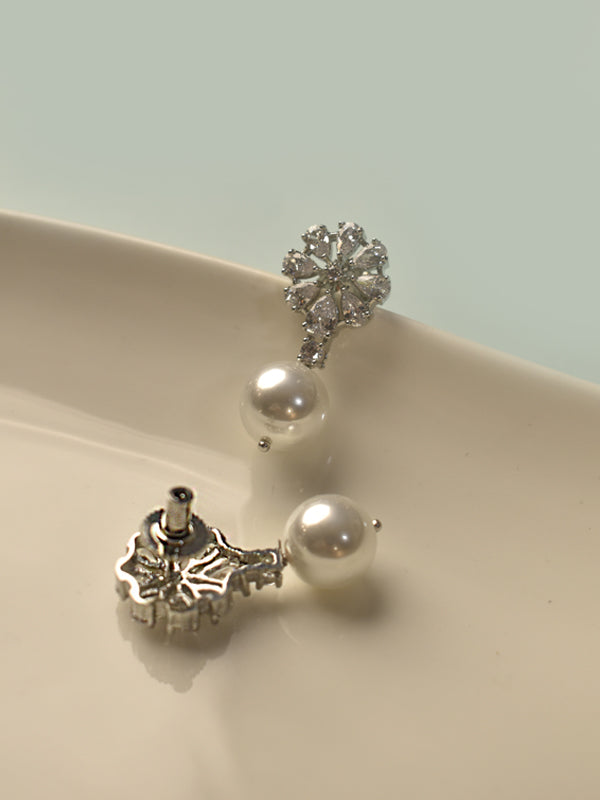 Snowflake shaped earrings with white pearls | white pearl earrings with ad stone