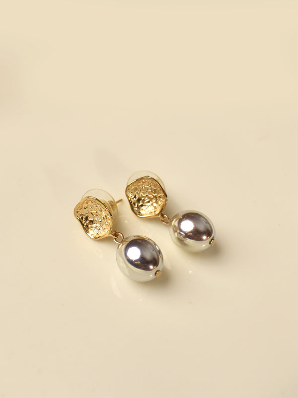 A pair of gold and silver drop earrings 