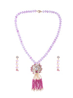 Load image into Gallery viewer, A purple beaded necklace with a gold-tone clasp and a central floral pendant 
