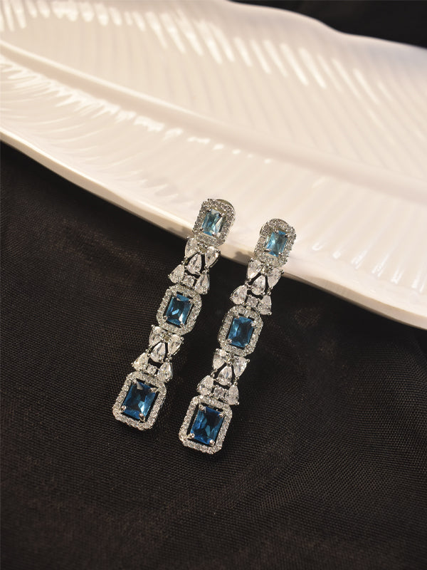 Wholesale Rhodium Plated Aqua Blue Petite Royal Oval Earrings - J GOODIN