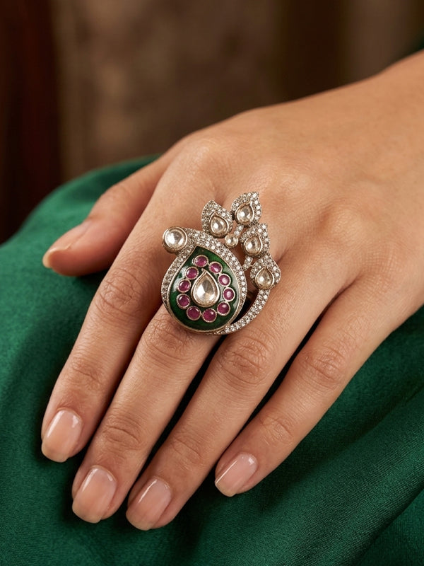 Beautiful finger ring with green and pink stones