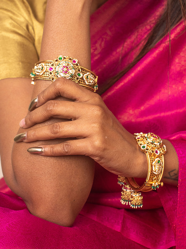  beautiful golden bangles with red and green stone 