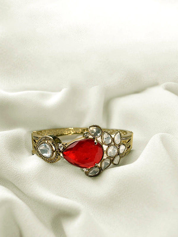 Bracelet with a red gemstone 