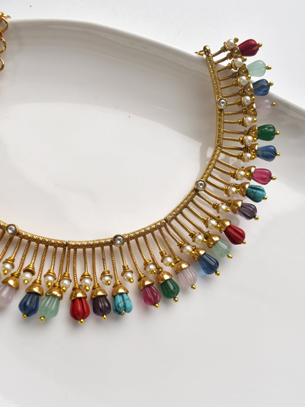 Colorful beaded necklace with golden accents 