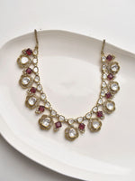 Load image into Gallery viewer, Decorative necklace with red and clear gemstones 
