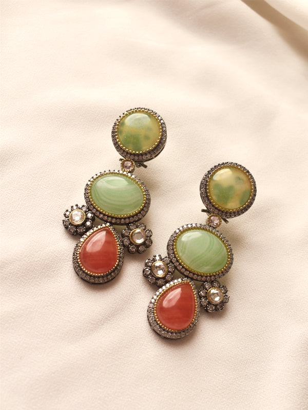 Earrings with green and orange stones