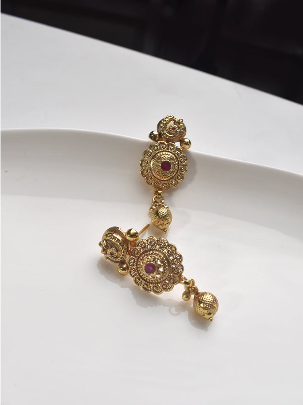 Earrings with intricate designs and Red Gemstones 