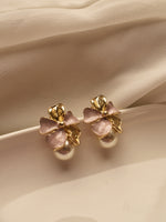 Load image into Gallery viewer, Earrings with pink bows and gold accents 
