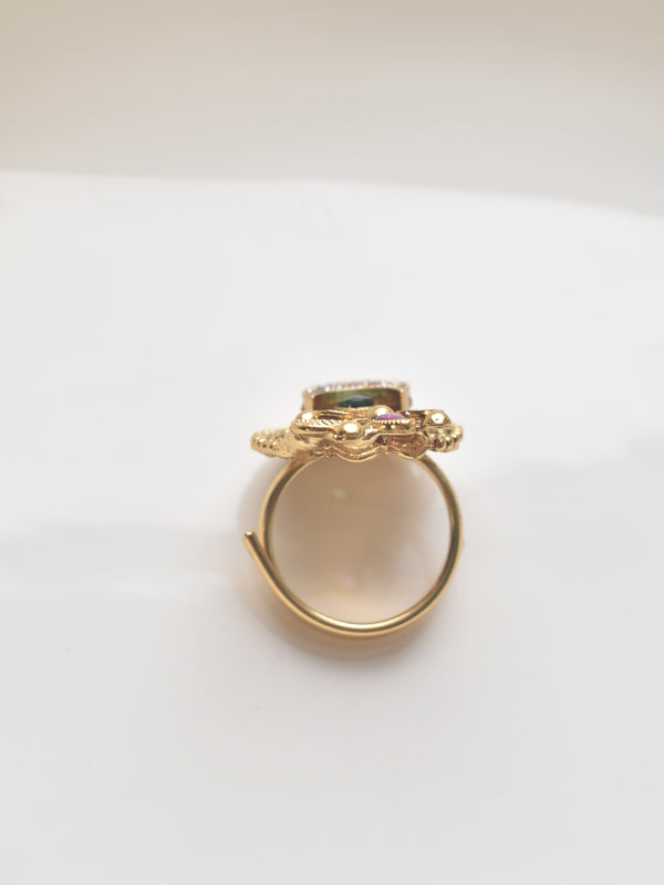 Finger ring with green and pink and golden finger ring with stone