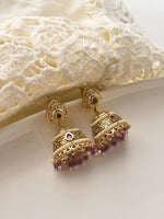 Load image into Gallery viewer, Gold earrings with red gemstones 
