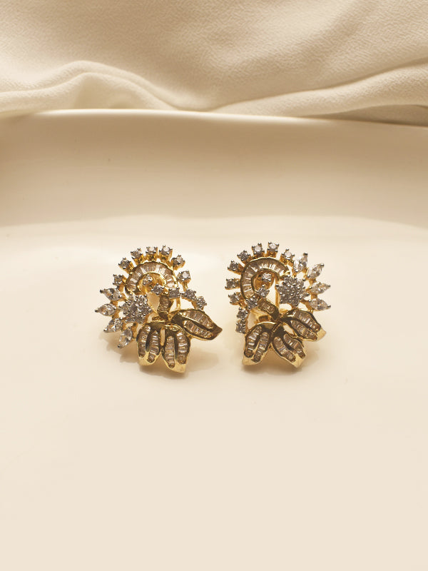 Gold earrings with intricate designs 