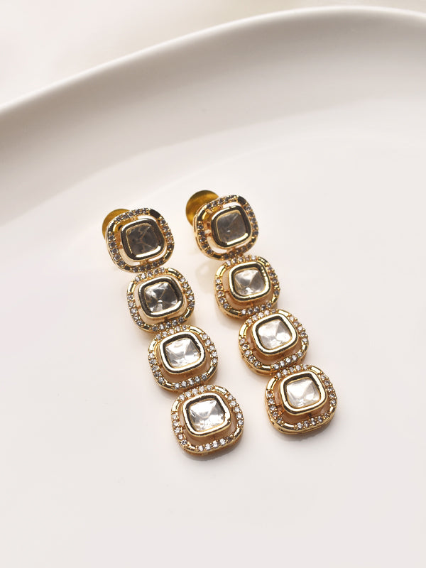 Gold earrings with square gemstones 