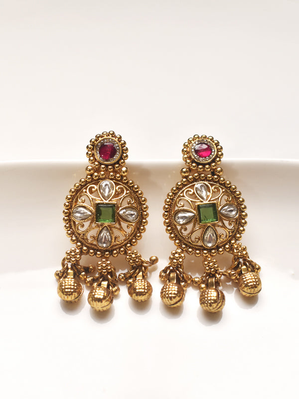 Golden earrings with gemstones 