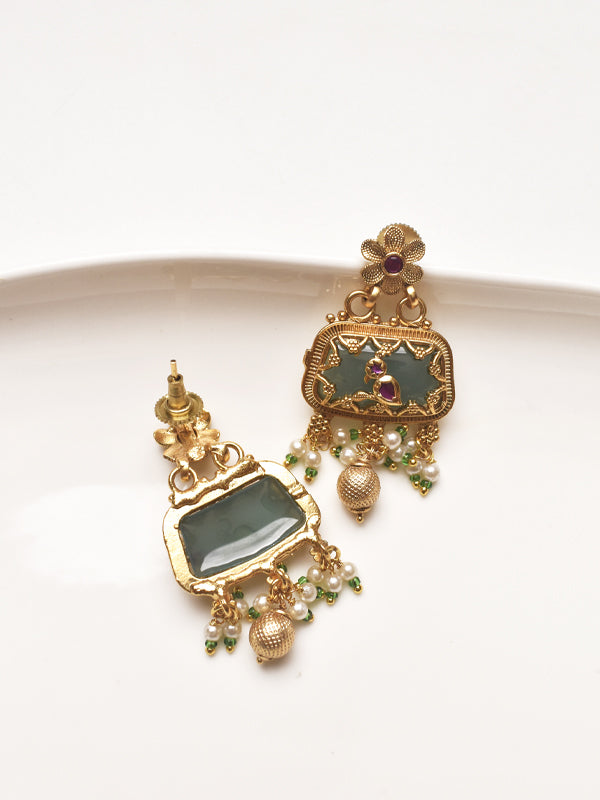 Gold earrings with green stones 