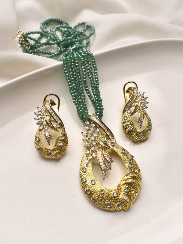 Golden Pendant Set with Intricate Design 