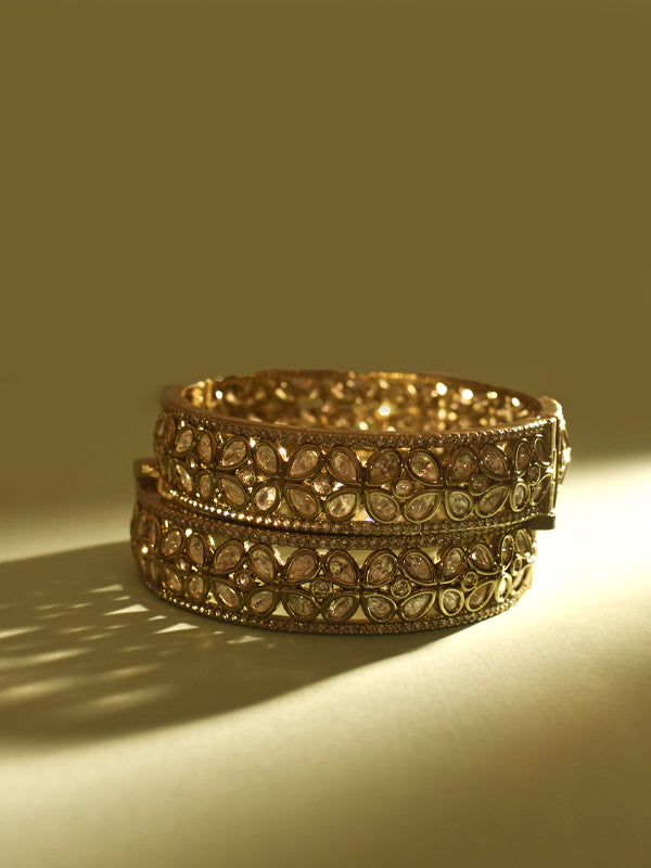 Golden bracelet with intricate design 