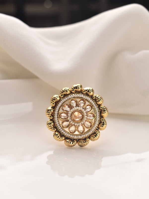 Golden ring with intricate design 