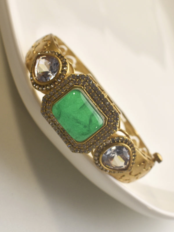 Golden Bracelet with Green Stone and Clear Stones 