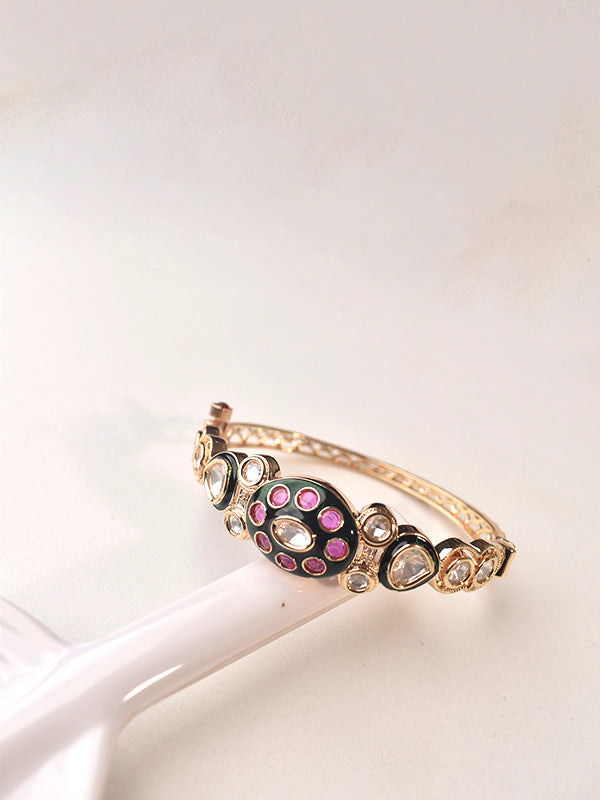Golden Bracelet with Pink Gemstones 