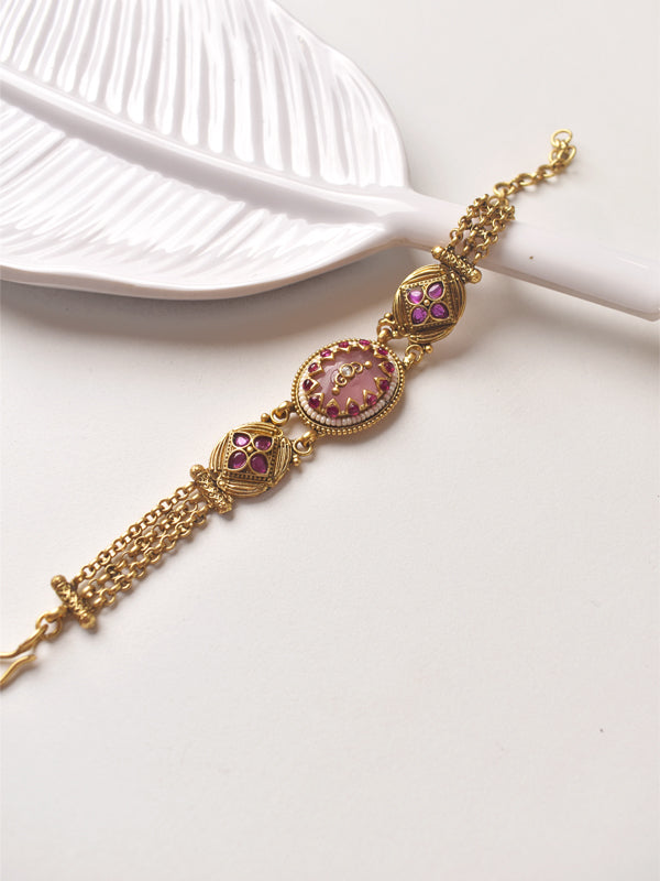 Golden Bracelet with Pink Gemstones 