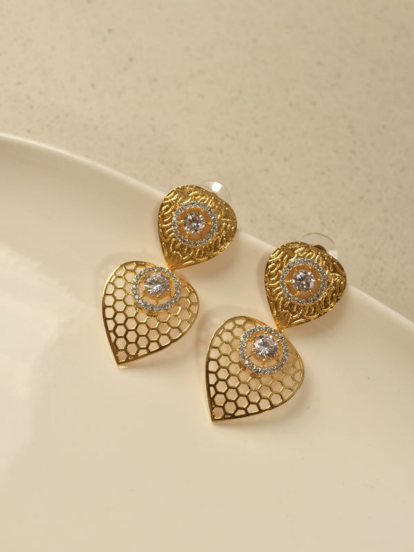Golden Heart-Shaped earrings with intricate designs 