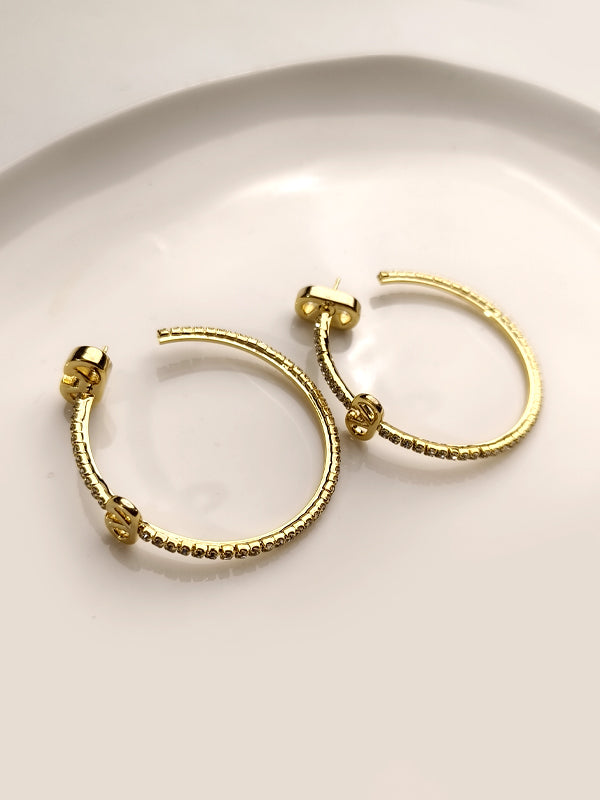 Golden hoop earrings | delicate crystal pavé open hoops