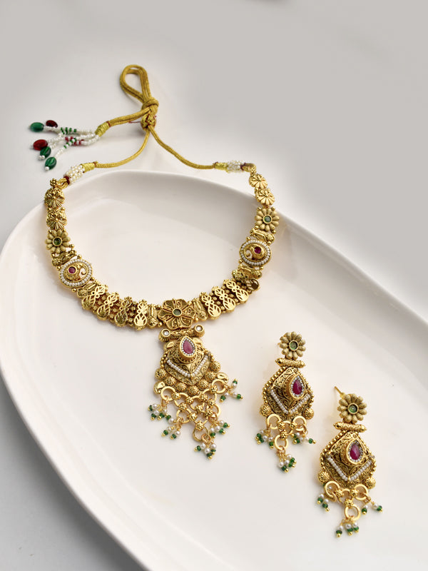 Golden Necklace with Red and Green Gemstones 