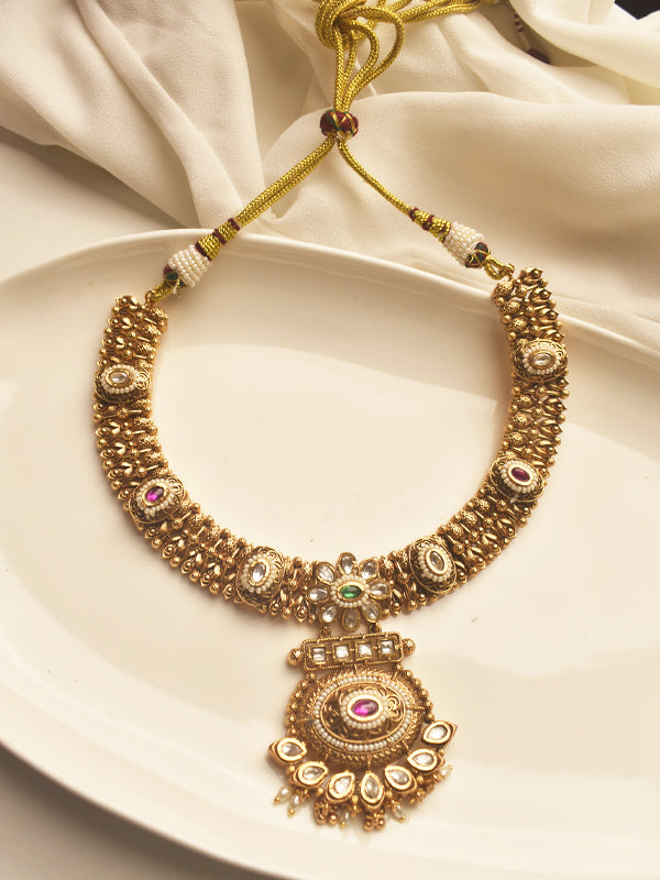 Golden Necklace with Intricate design and Kundan