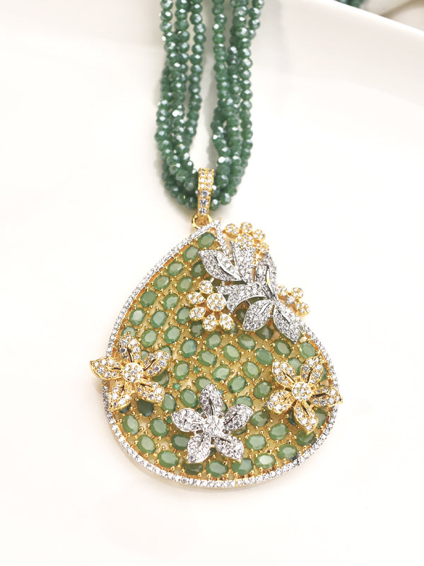Golden Pendant with Green Gemstones 