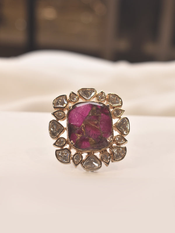 Golden Polish Ring with a Large Red Gemstone
