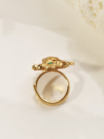 Load image into Gallery viewer, Golden Ring with Intricate Design and Green Gemstone 

