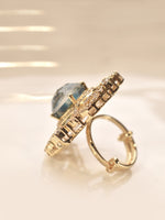 Load image into Gallery viewer, Golden Ring with a Blue Gemstone 
