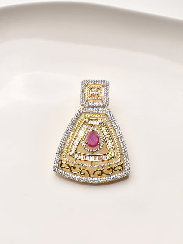 Golden and Silver pendant with a pink gemstone 