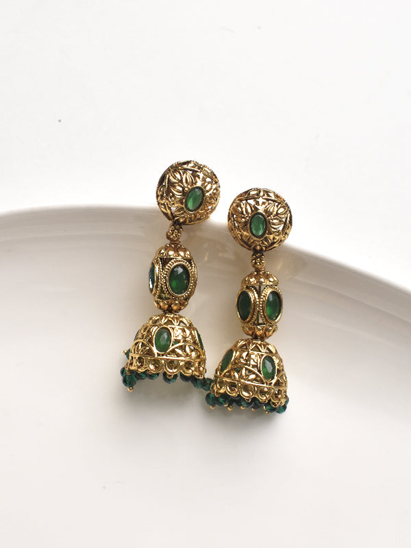 Golden earrings with green gemstones 