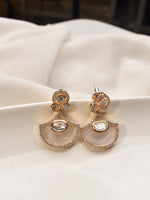 Load image into Gallery viewer, Golden earrings with clear stones 

