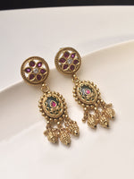 Load image into Gallery viewer, Golden earrings with floral designs and gemstones 
