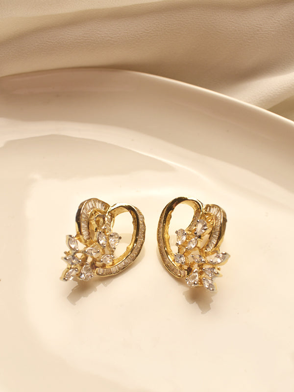 Golden hoop earrings with floral designs 