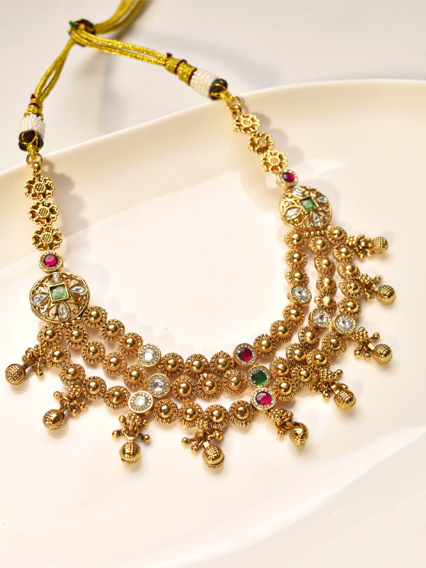 Golden necklace with gemstones 