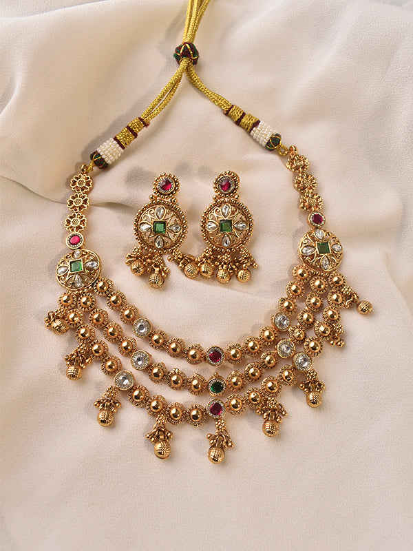 Golden necklace with gemstones 